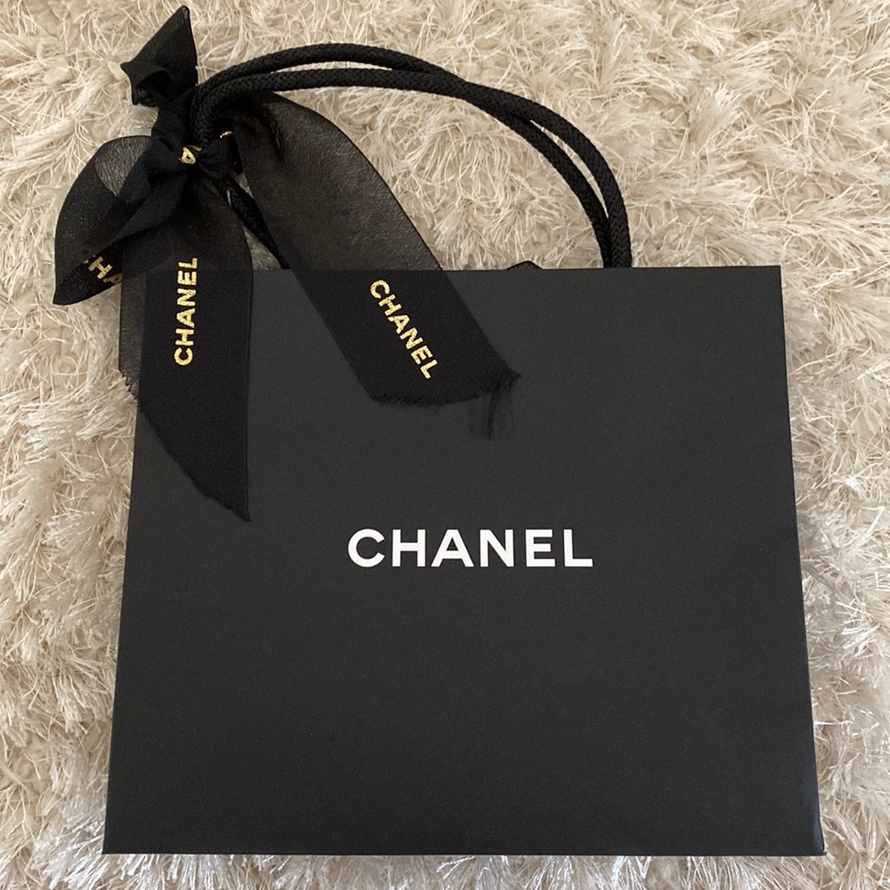 Chanel Paper Shopping Bag with a black ribbon